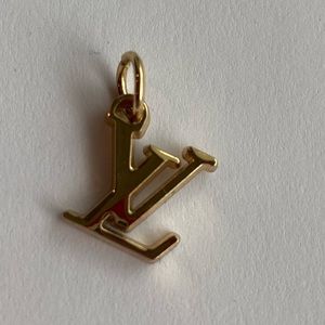 Authentic Louis Vuitton pendant charm